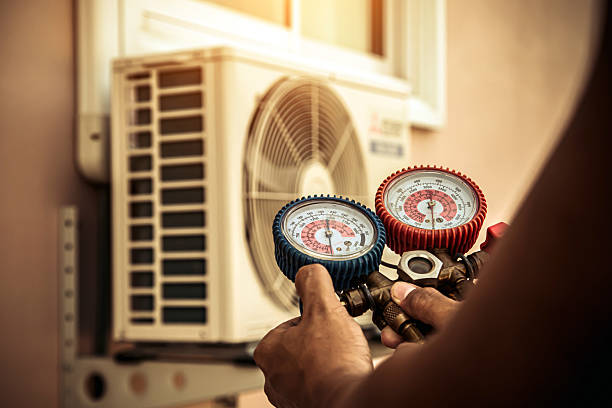 Professional Air Conditioning Service technician working in Schuylerville, NY